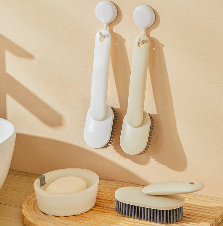 Shoe brush with inclined handle-cream color-bristle PET+ handle PP-1 piece
